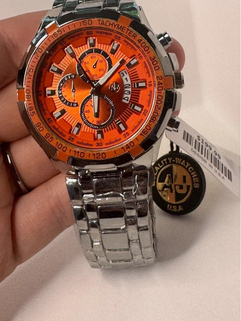 AJ sports-master men’s stainless steel watch orange dial 46mm